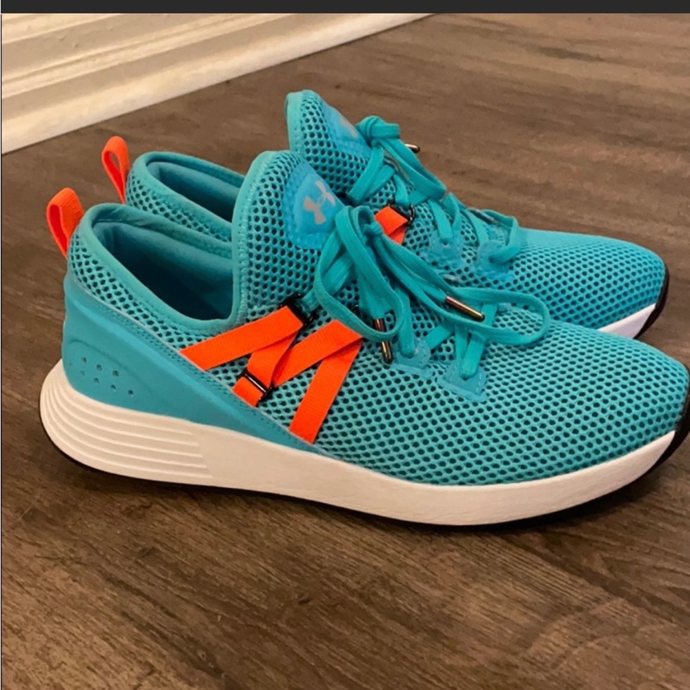 Under Armour turquoise shoes. Like new gently warn.